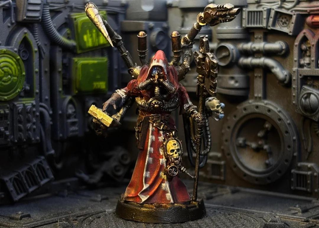 Finished Magos Pasqal conversion standing in a Mechanicus-themed display.